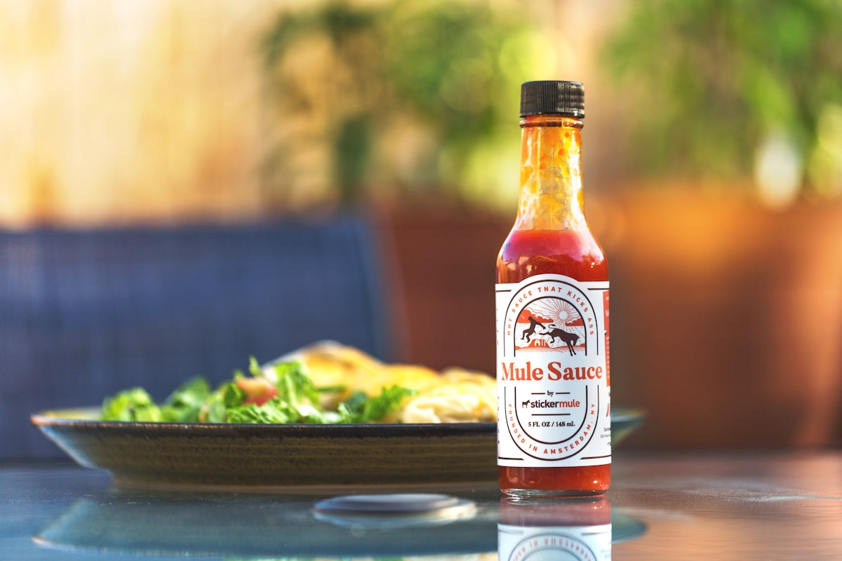 selective focus photography of as b bottle