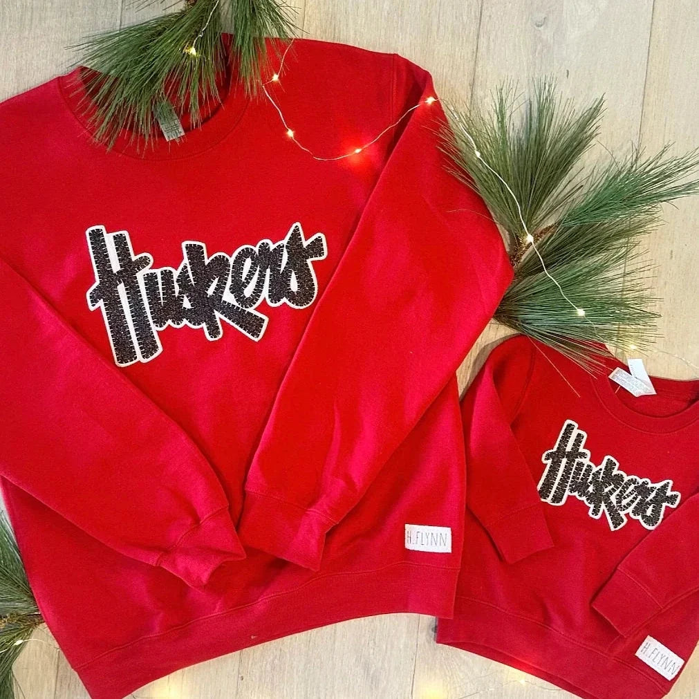 Huskers Sewn Appliqué Black Sparkle Red Licensed Youth Crewneck Sweatshirt | Multiple Sizes | H.Flynn Designs