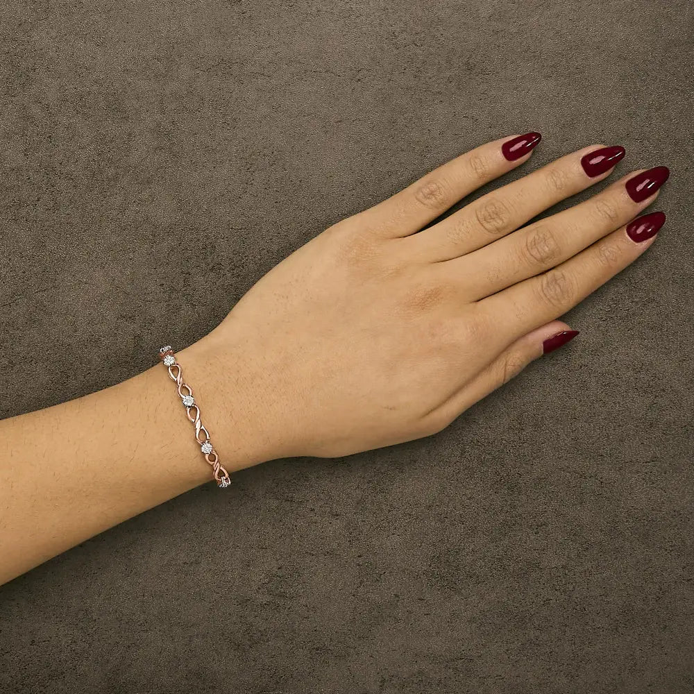 1/2 cttw diamond infinity link bracelet in rose gold plated silver bijoux-nyc direct