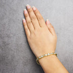 14k yellow gold 7.0 cttw baguette and princess diamond wave bracelet 7 bijoux-nyc direct