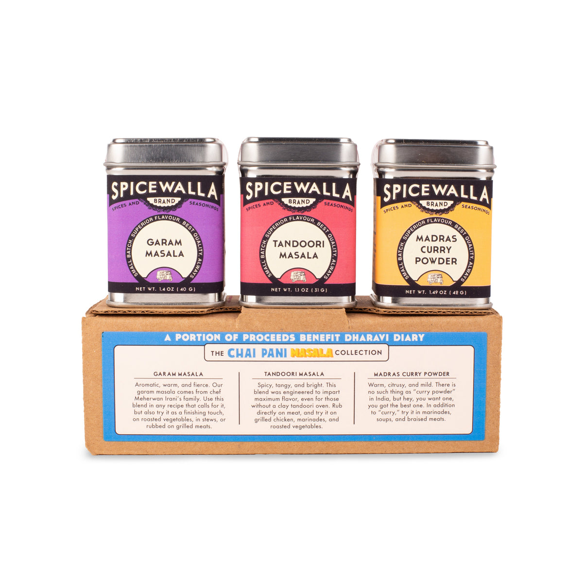 Three Spicewalla spice tins in a cardboard holder on a white background