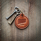 Connecticut State Silhouette Leather Keychain Circle
