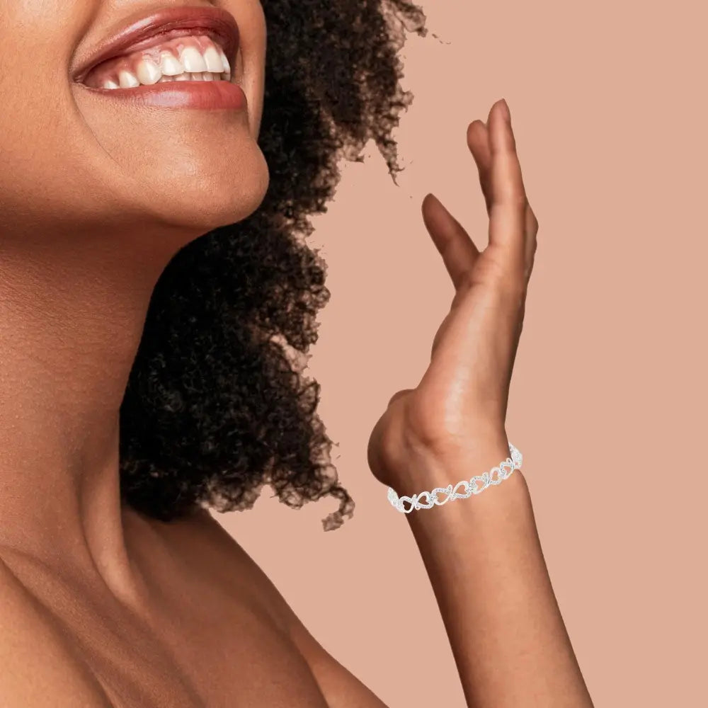Sterling silver 1/3 cttw diamond double heart infinity 7.25 inch bracelet bijoux-nyc direct