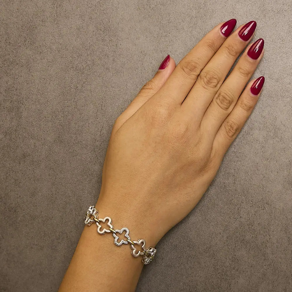 Two-tone sterling silver diamond clover tennis bracelet 1/10 cttw bijoux-nyc direct