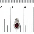 .925 Sterling Silver Garnet and 1/5 Cttw Diamond Drop Earring