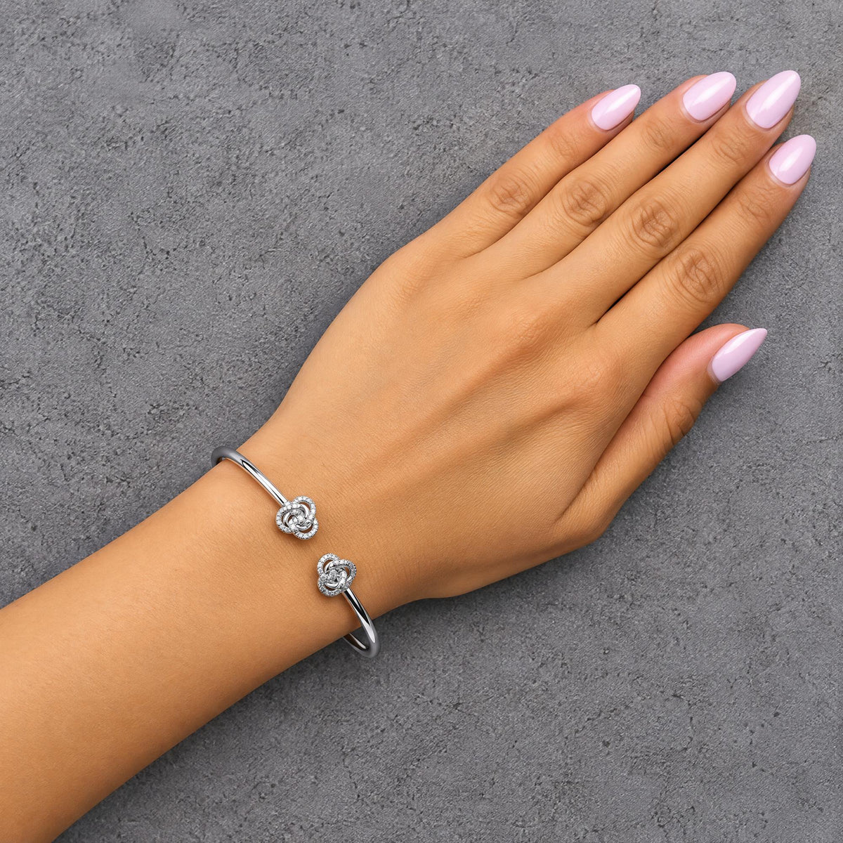 .925 Sterling Silver Diamond Accent Love Knot Flexy Open Bangle Bracelet