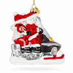 Retro Santa and Mrs. Claus on Snowmobile Glass Christmas Ornament