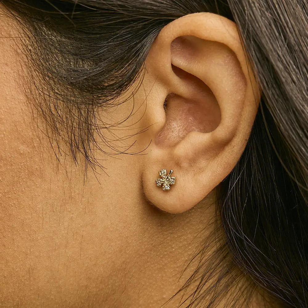 Diamond accent four leaf clover stud earrings in 10k yellow gold bijoux-nyc direct