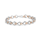 Diamond infinity and swirl link bracelet in 10k two tone gold 1/4 cttw bijoux-nyc direct
