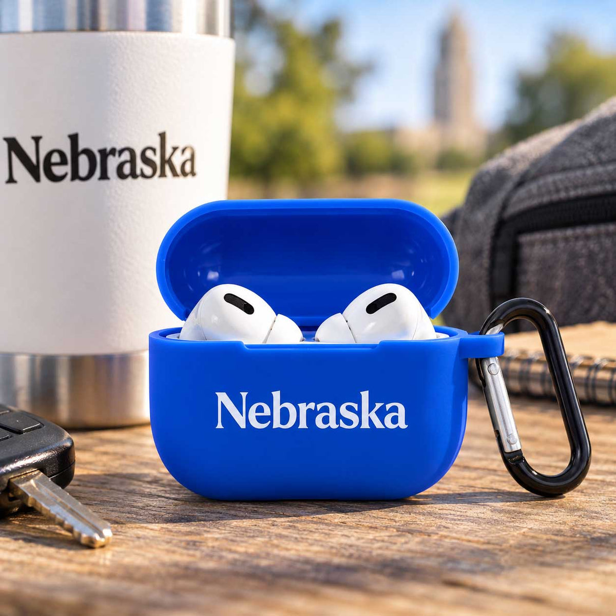 Nebraska Airpod Case Holder | Blue | Nebraska Department of Economic Development